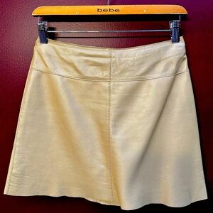 Bebe Pearl Beige Leather Mini Skirt